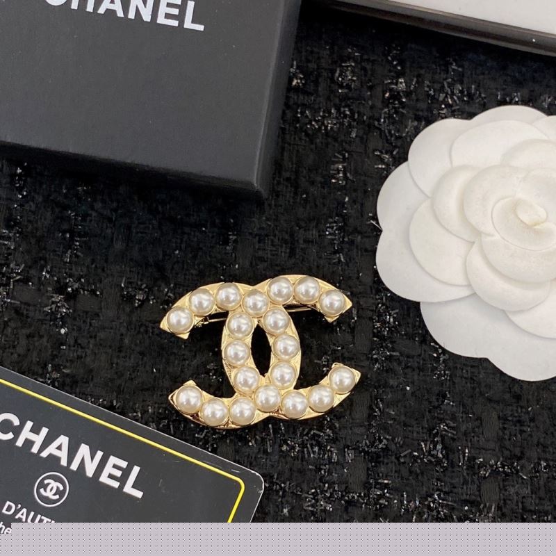 Ch*el brooches